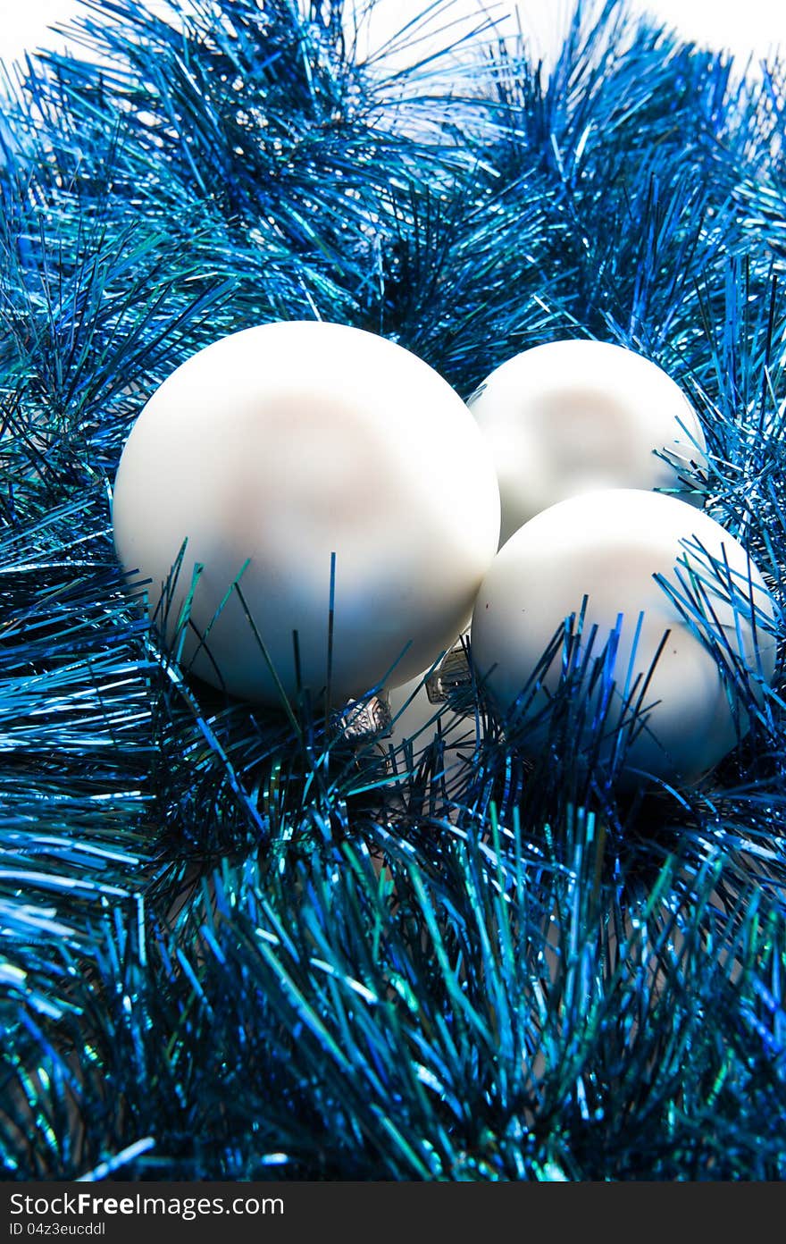 Silver bauble on blue Christmas decoration