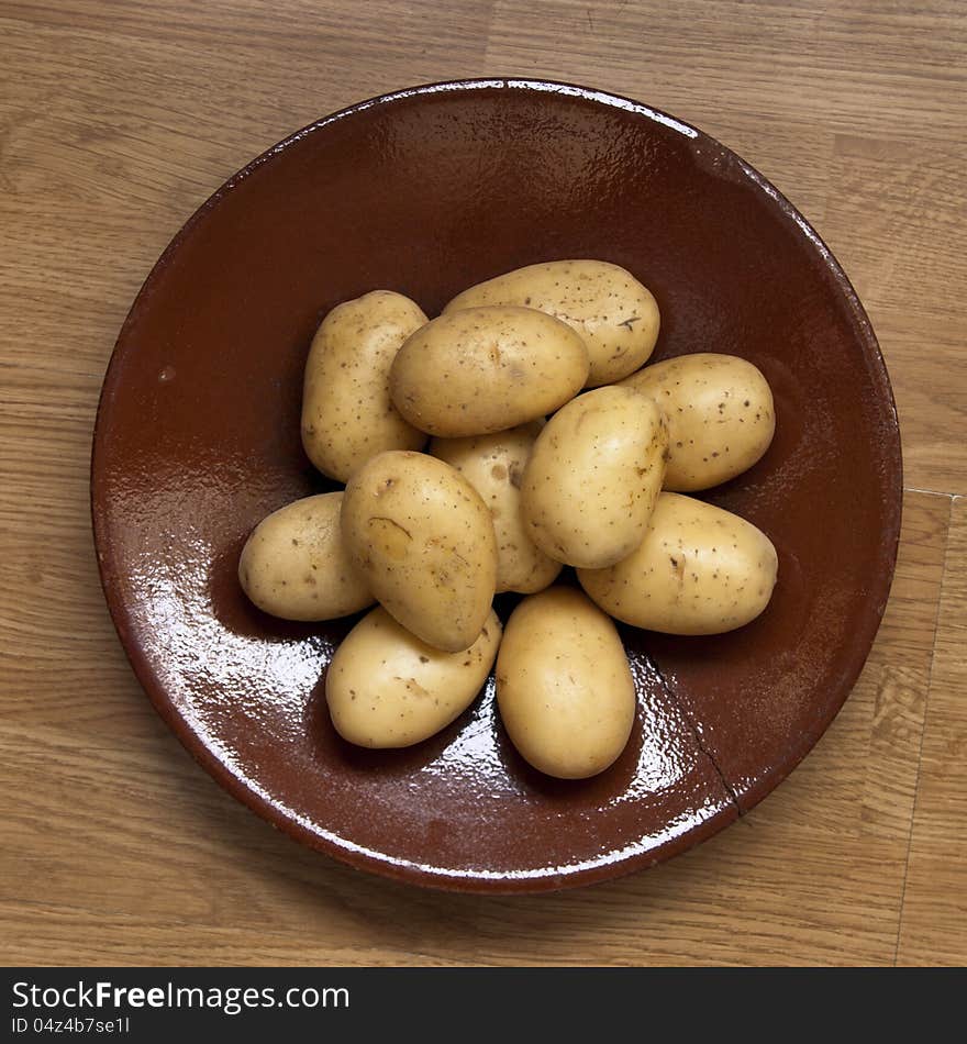 Potatoes on ceramic plate