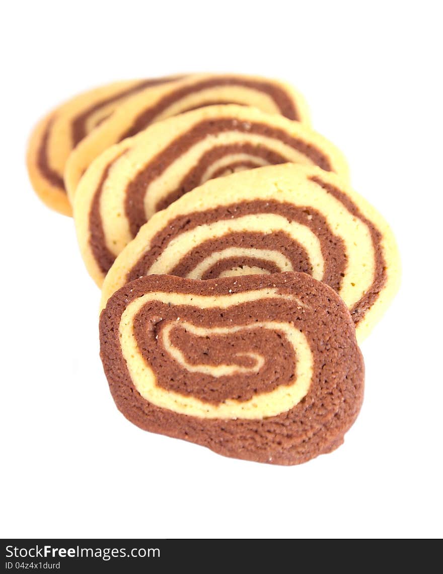 Heap of delicious striped cookies  on white background.