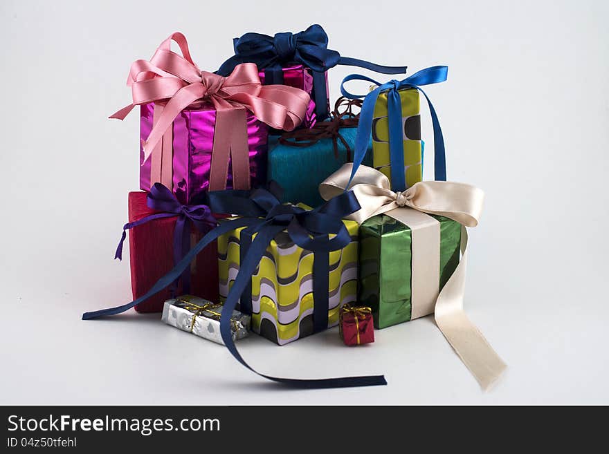 Multi-colored gift boxes on holidays and new year. Multi-colored gift boxes on holidays and new year