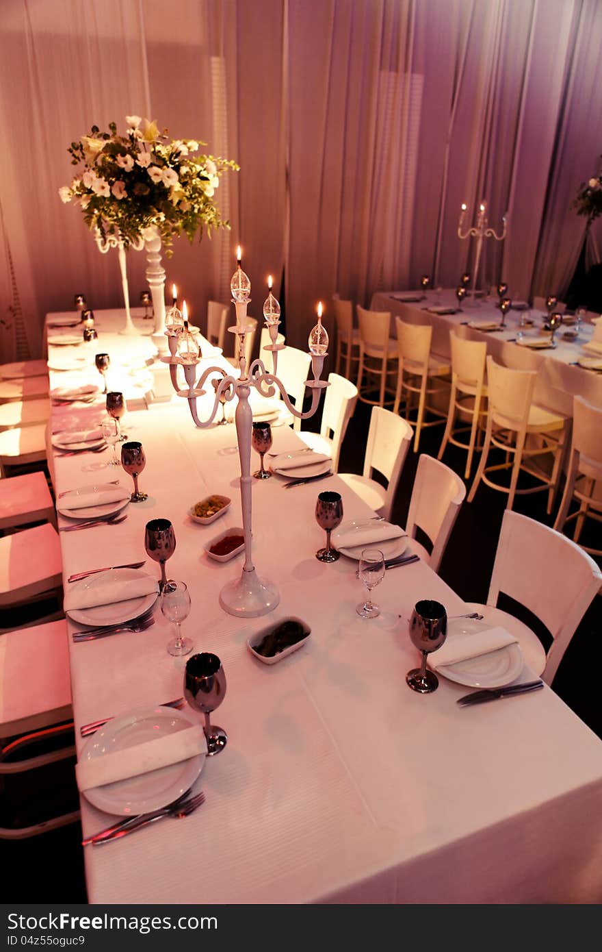 Banquet table laid for a large number of people