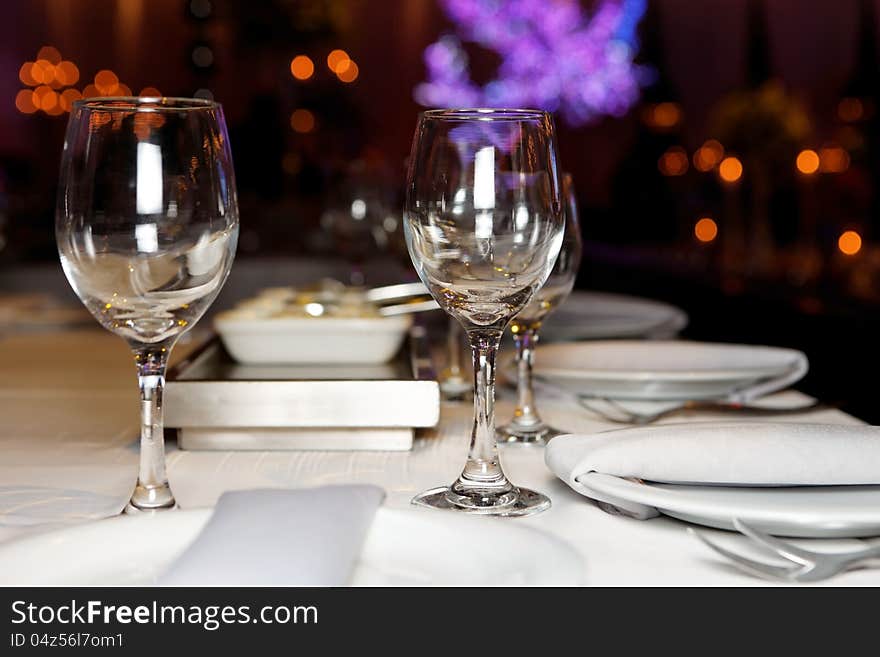 Bright banquet table laid for a festive evening