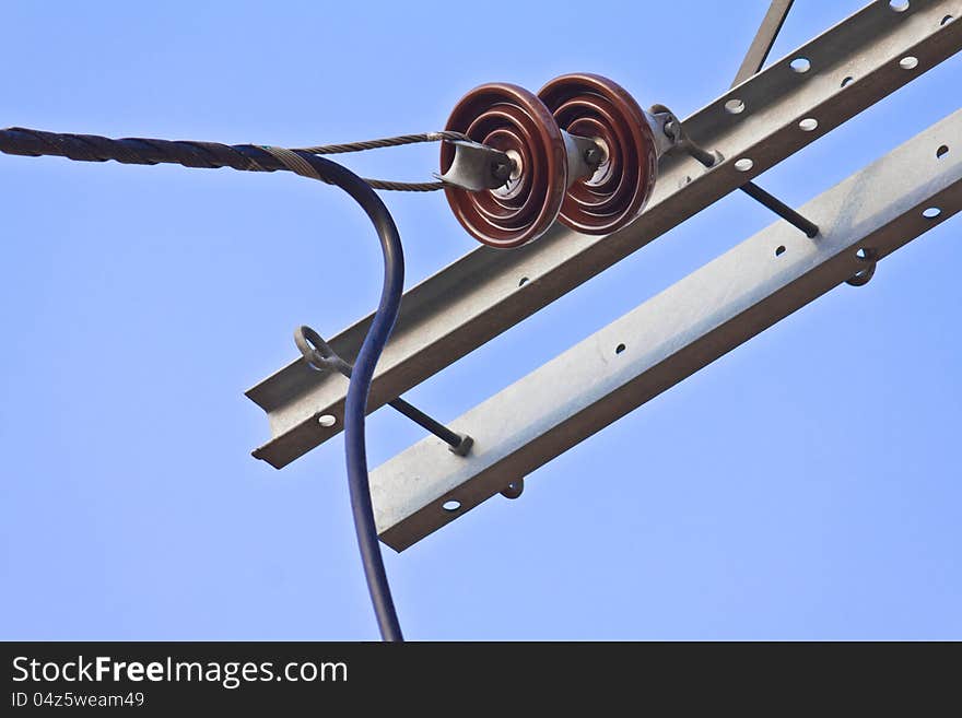 Ceramic insulator used on electricity post. Ceramic insulator used on electricity post.