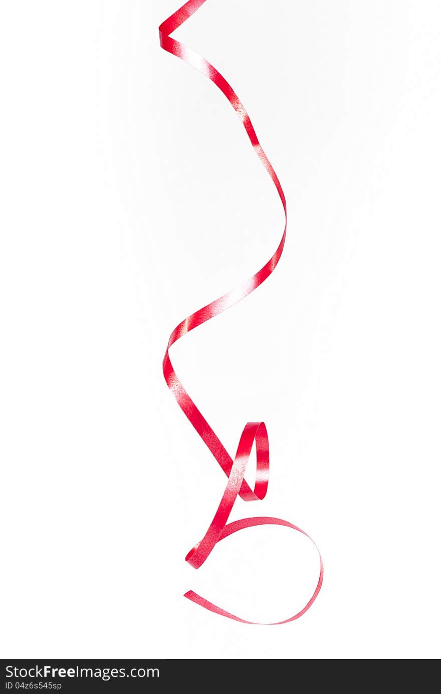 Red celebratory tape  on white background