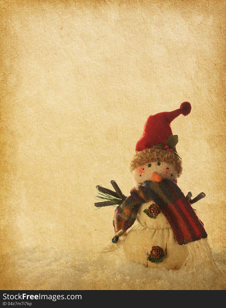 Old paper background with  snowmen