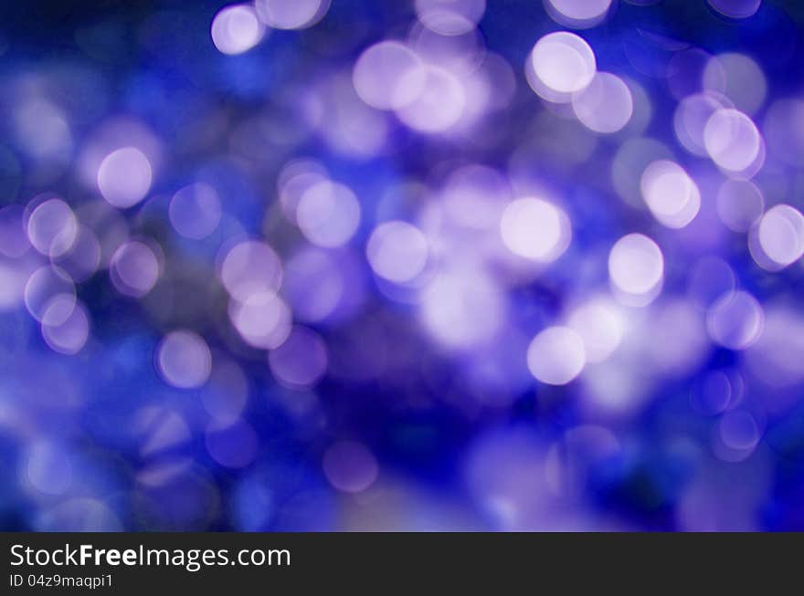 Abstract holiday background, beautiful shiny Christmas lights, glowing magic bokeh