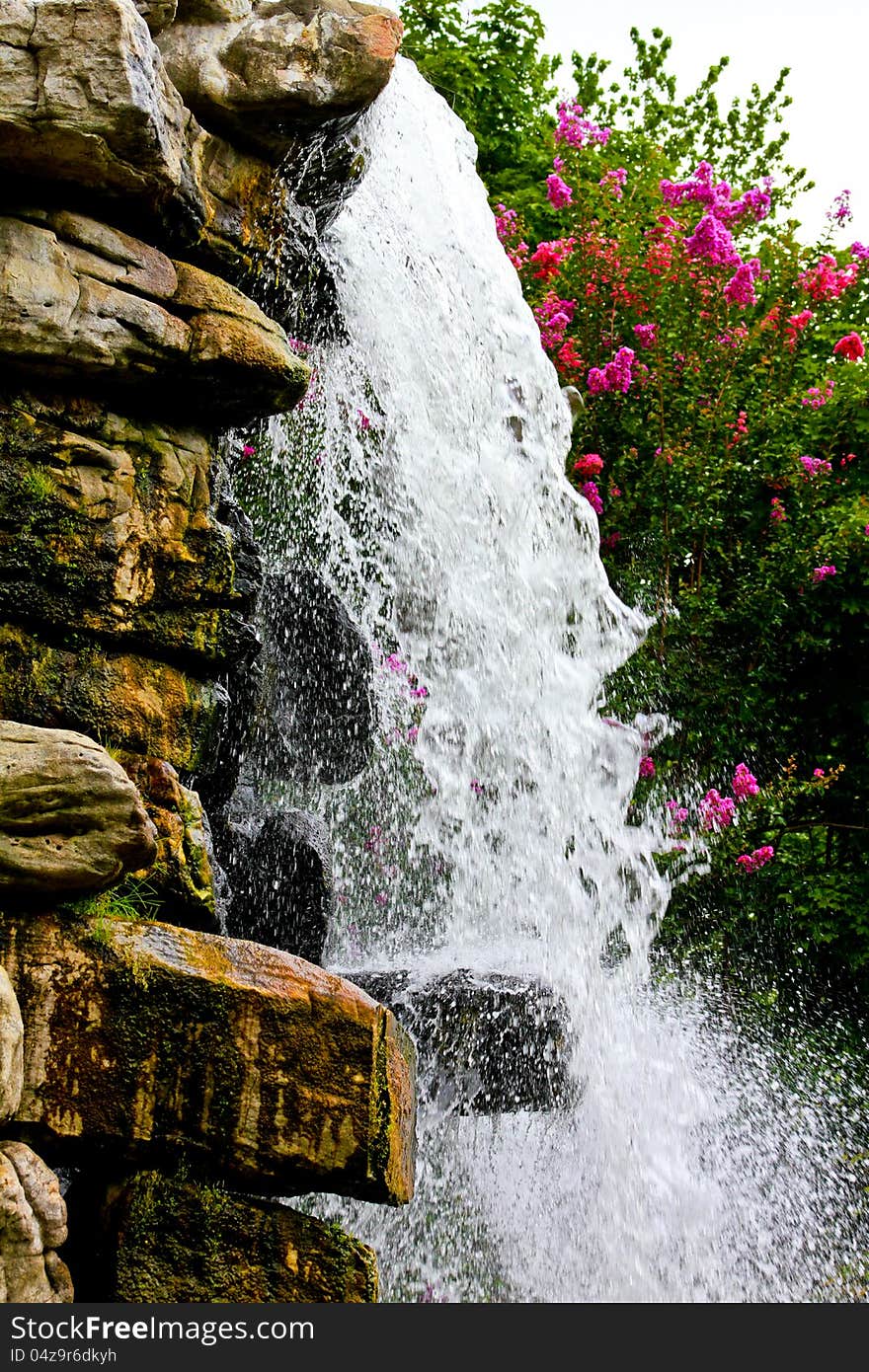 Water cascading down a waterfall.