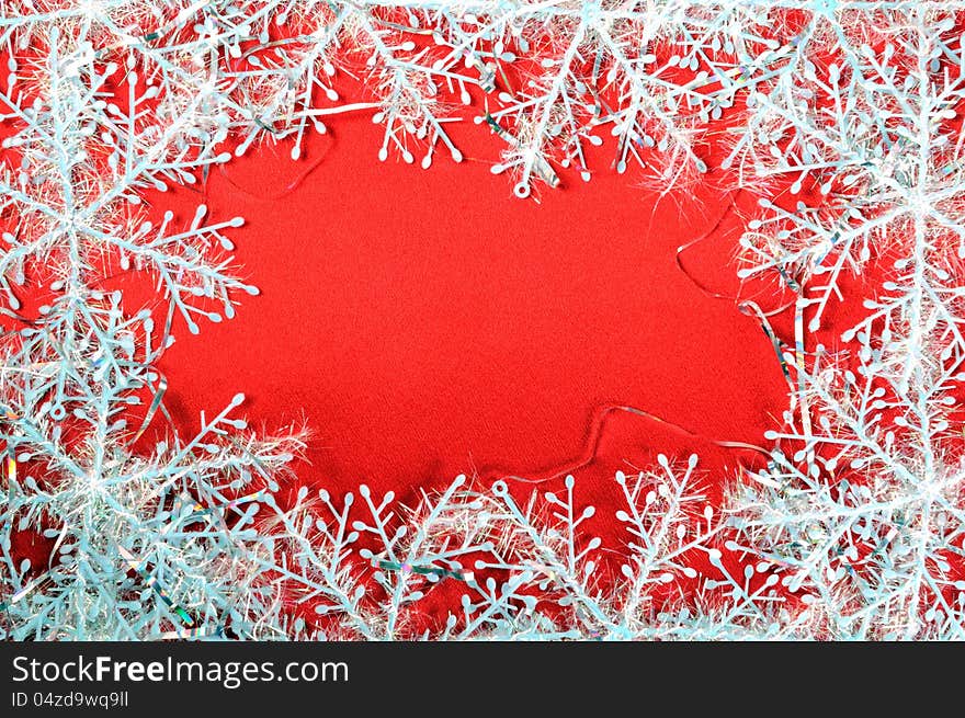 Snowflakes on a red background, christmas decoration. Snowflakes on a red background, christmas decoration