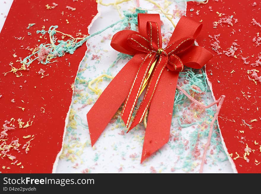 The red ribbon and paper ripped for celebration