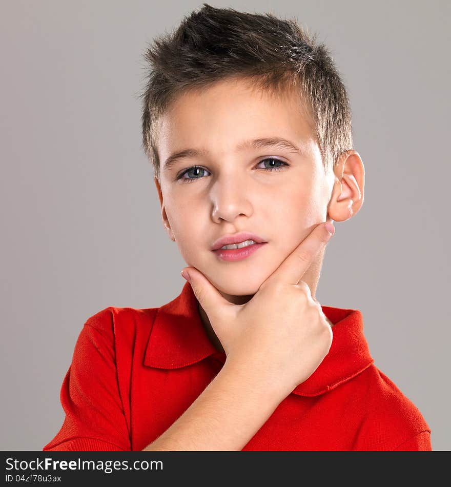 Adorable young beautiful boy posing at studio. Adorable young beautiful boy posing at studio