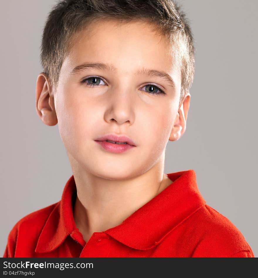 Adorable young beautiful boy posing at studio. Adorable young beautiful boy posing at studio