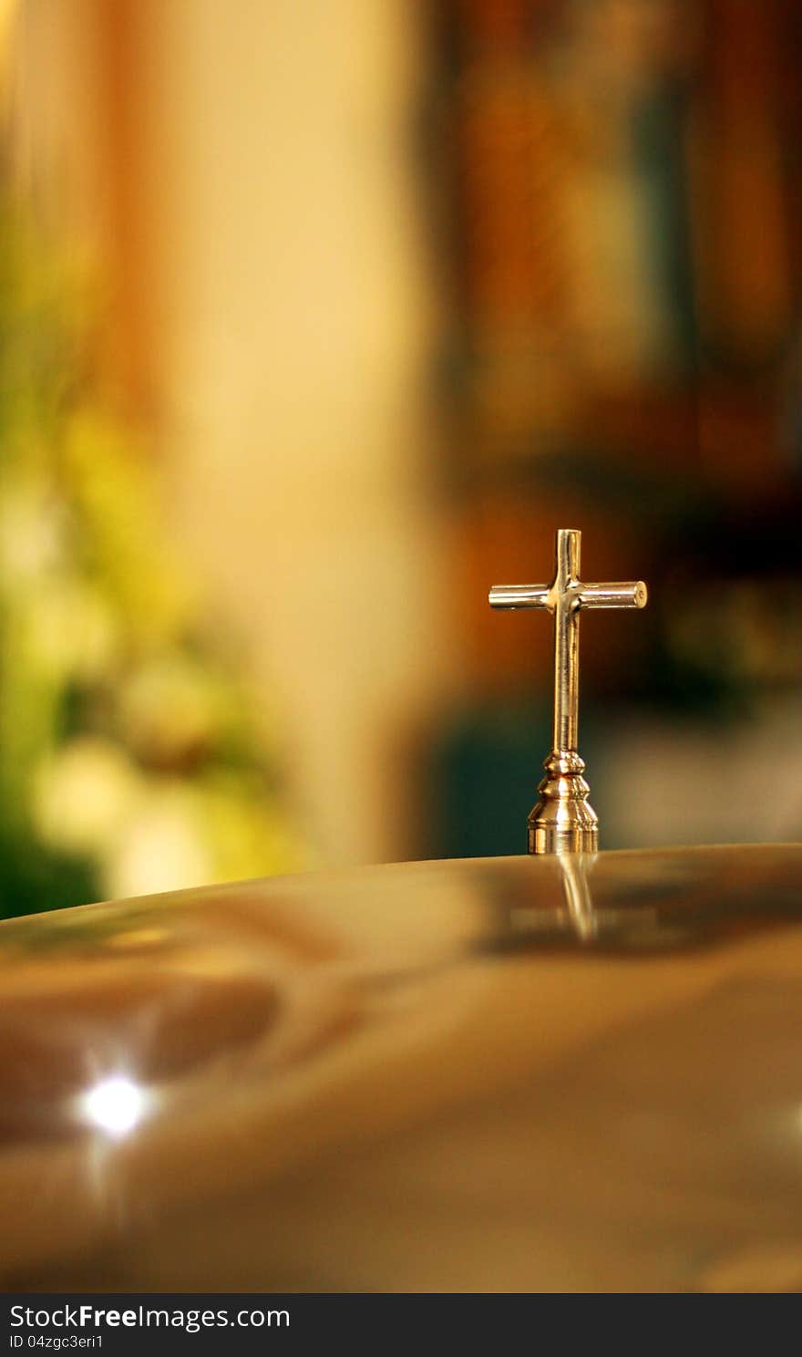 Metal cross with blurred background. Metal cross with blurred background