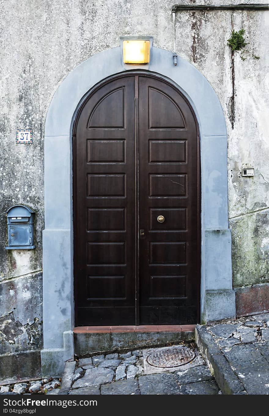 Italian door in small village, Italy