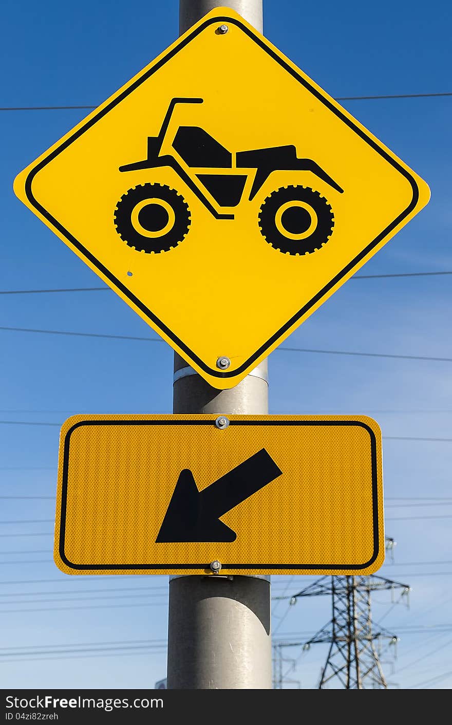 Motocross crossing road sign ahead