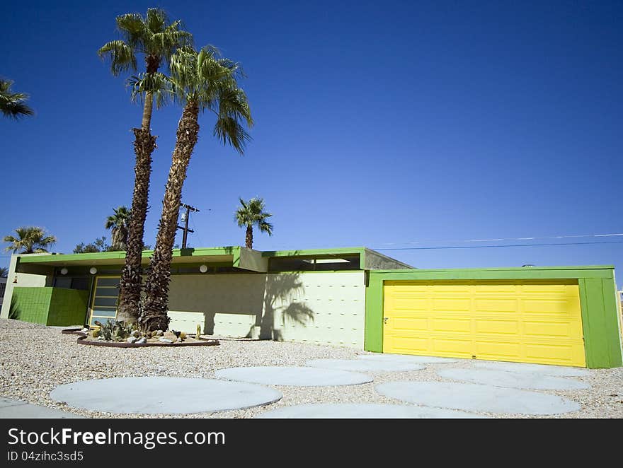 Mid-century modern Palm Springs House with Yellow Garage