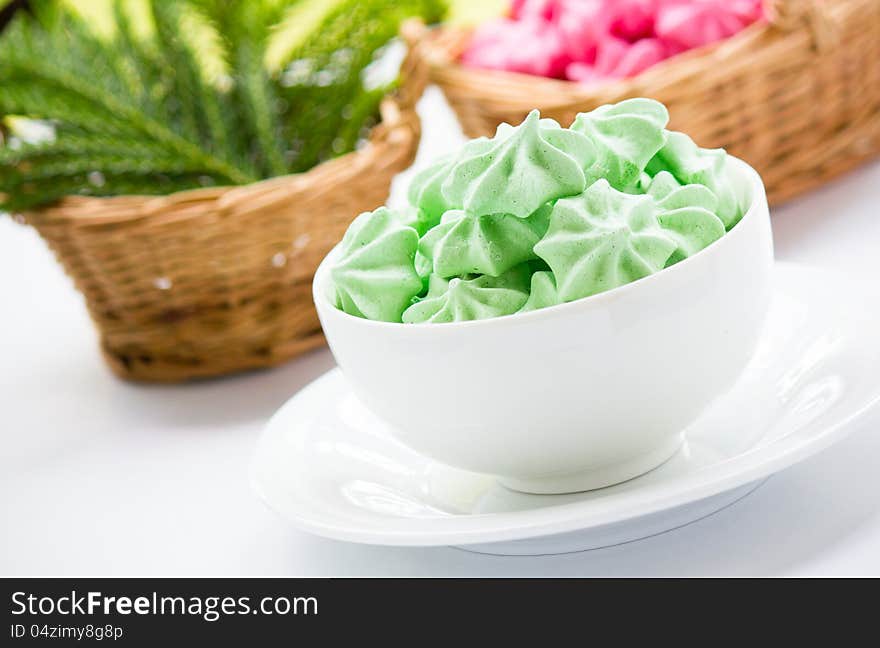 Green Meringue cookies in a bowl