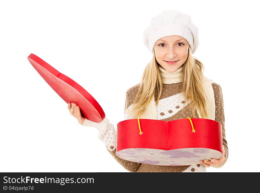 Teen girl holding heart shaped box. Teen girl holding heart shaped box