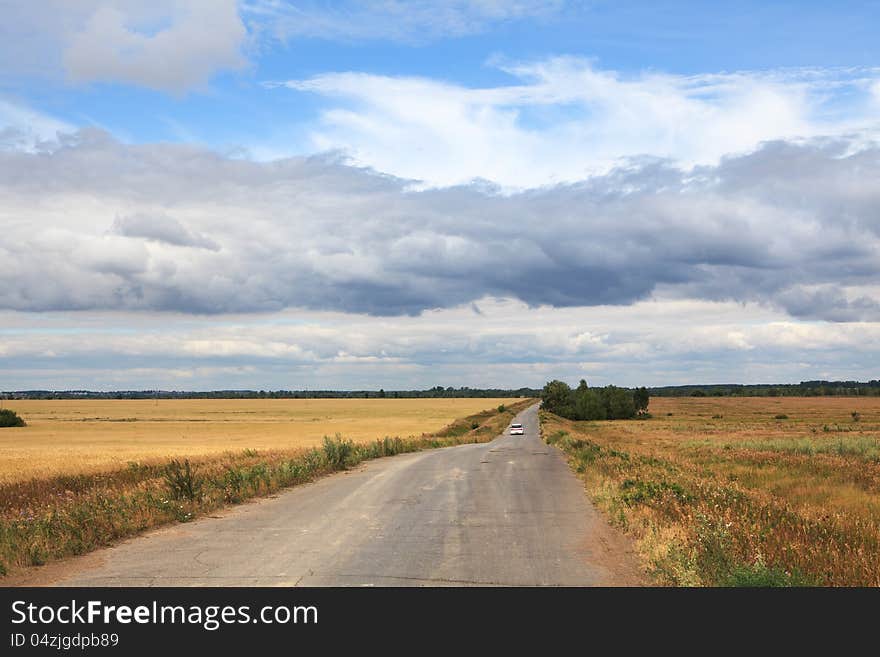 Storm clouds over the road