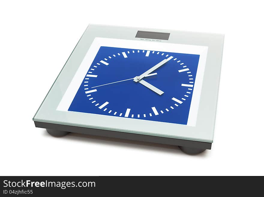 Bathroom scales with the clock on a white background