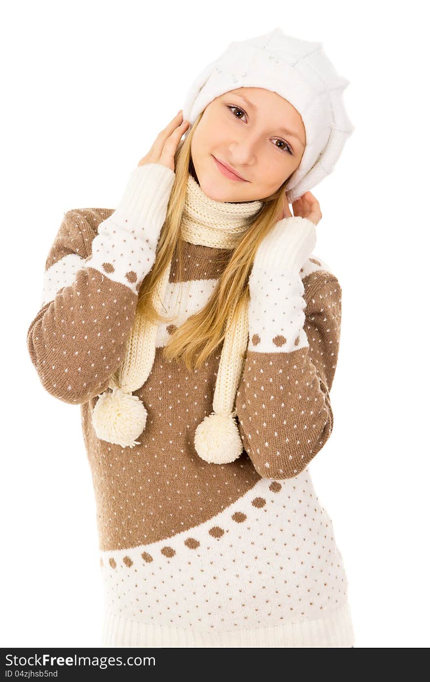 Teen girl in a cap and scarf