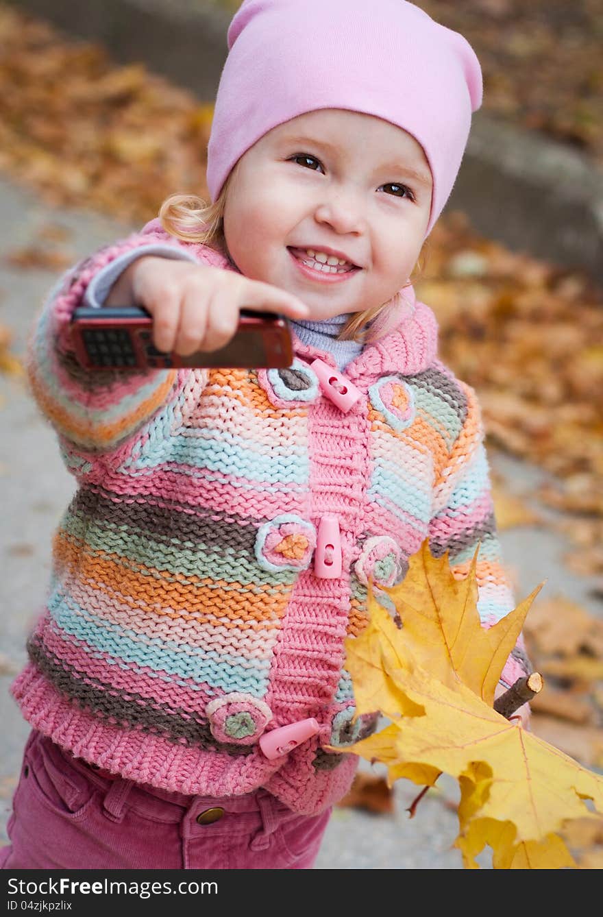 Baby girl with mobile phone. Baby girl with mobile phone