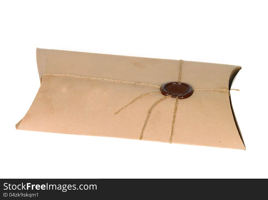 Parcel with rope and wax seal isolated on white background