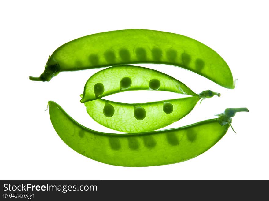 Transparent pea slices on white background