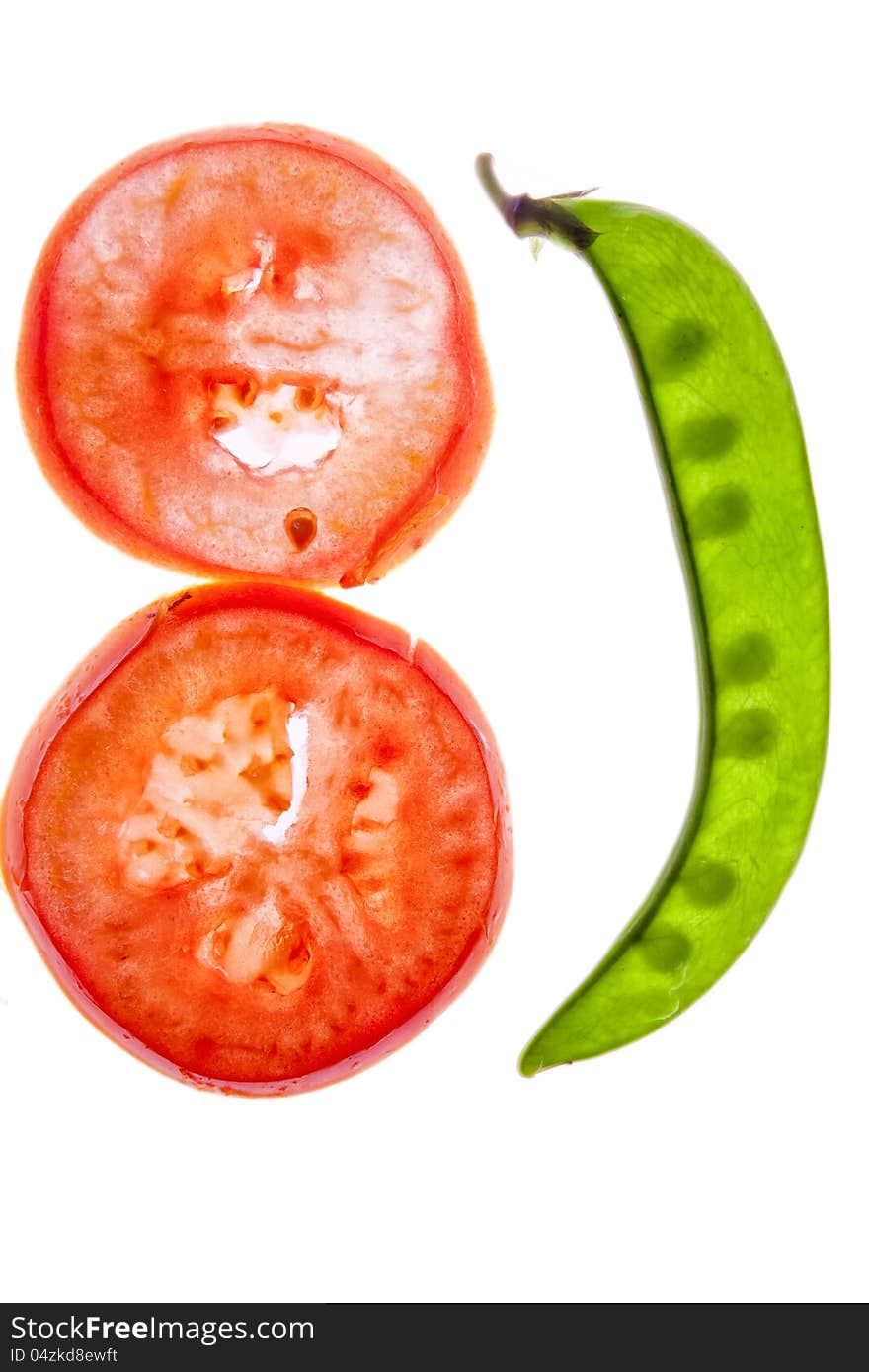 Transparent pea and tomato slices on white background