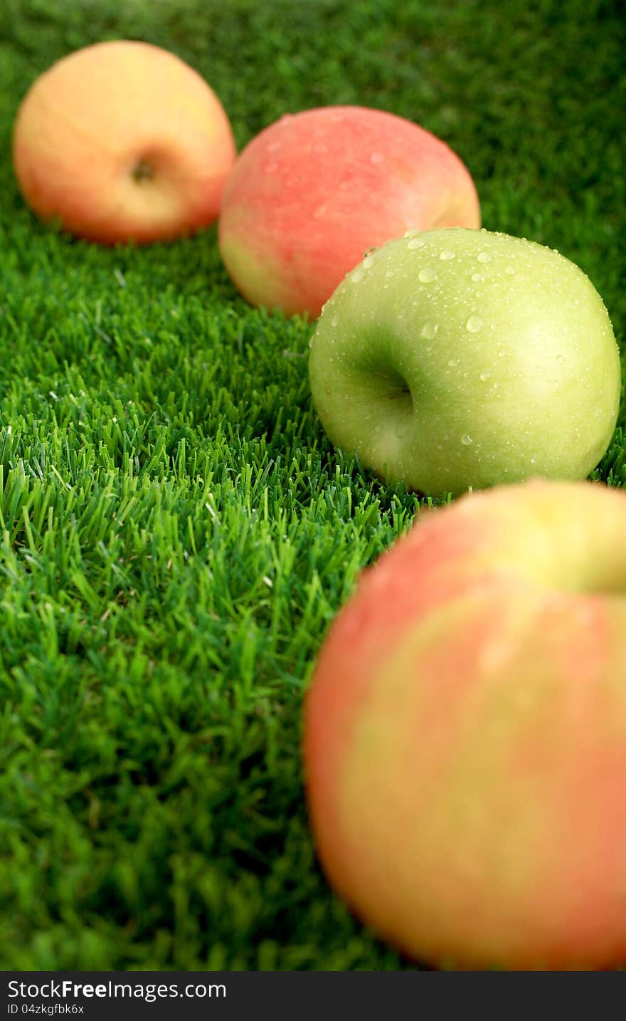 Apples on the grass