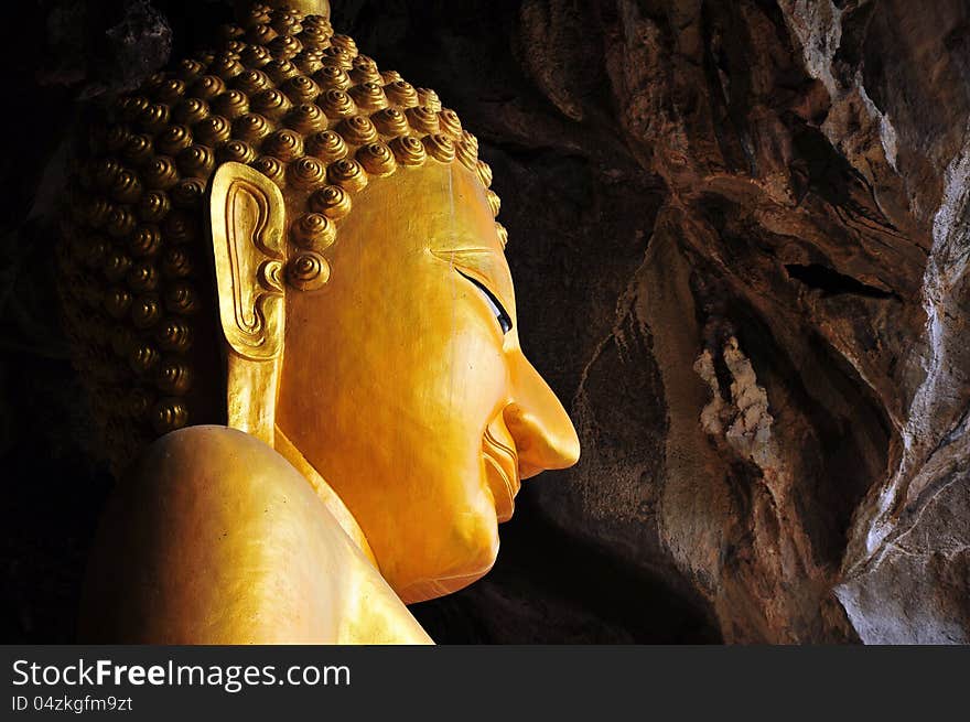 Buddha image in the cave, thailand