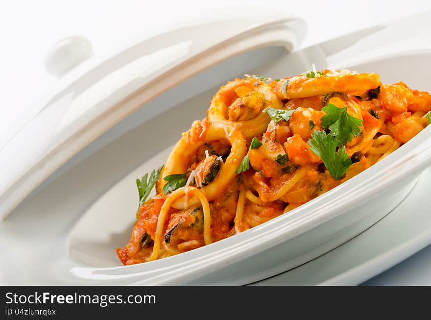 Seafood spaghetti on white dish