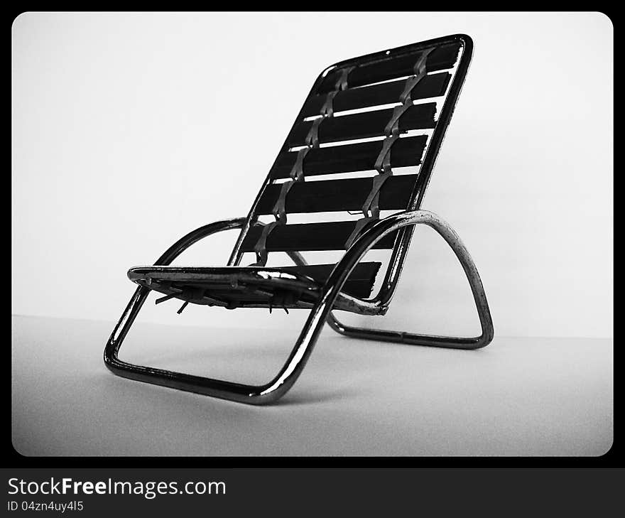 Abstract of a Metal seat on a white background