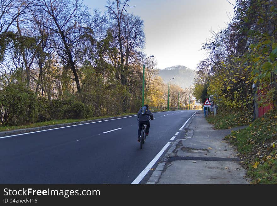 A picture made in brasov at a bicyclist on road