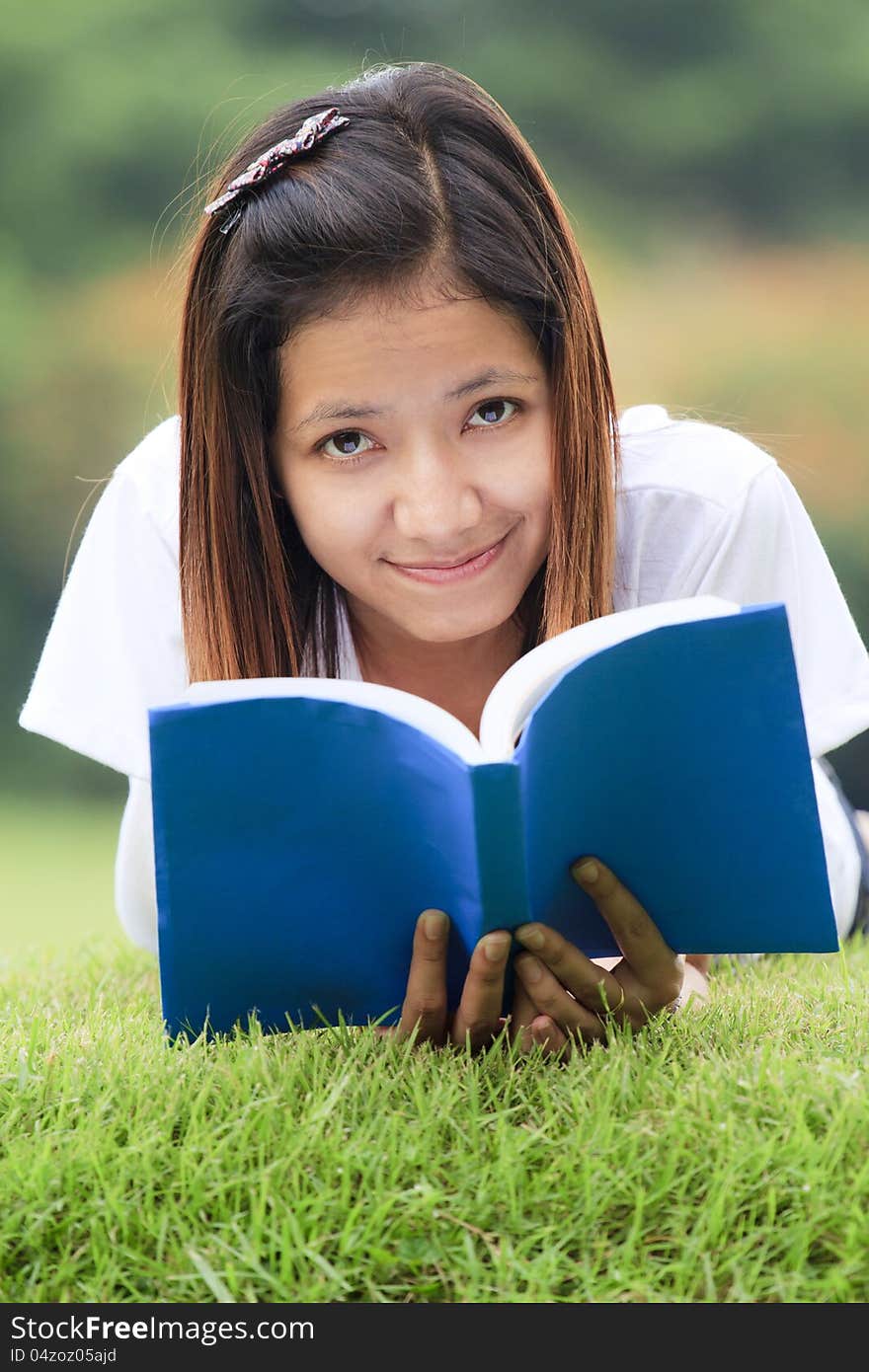 Young women open a book