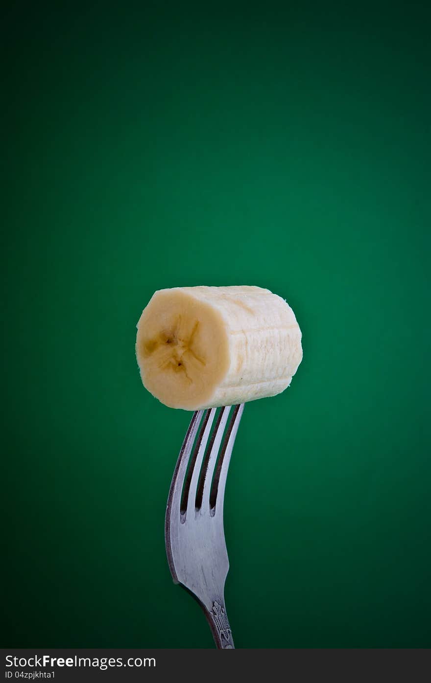 Piece of banana on a fork