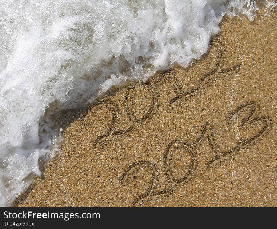 2013 written in the sandy beach