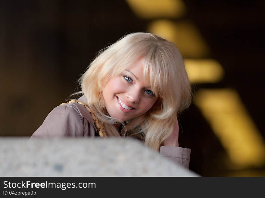 An image of pretty, friendly young woman smiling at the viewer. An image of pretty, friendly young woman smiling at the viewer