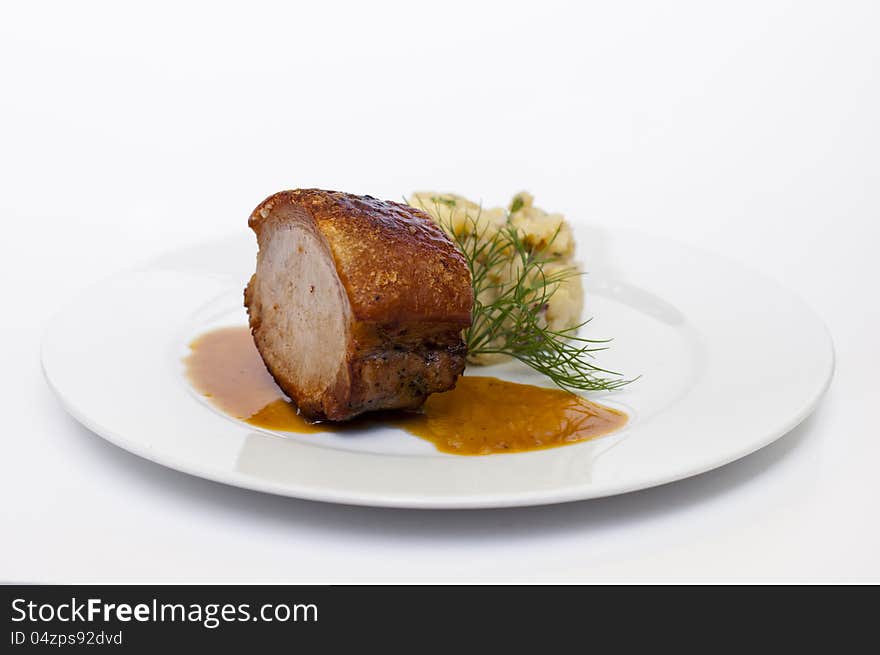 Baked meat with brown sauce. Baked meat with brown sauce