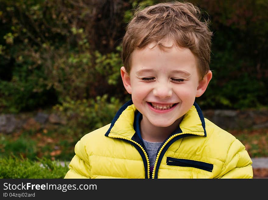 Smiling boy with closed eyes. Smiling boy with closed eyes