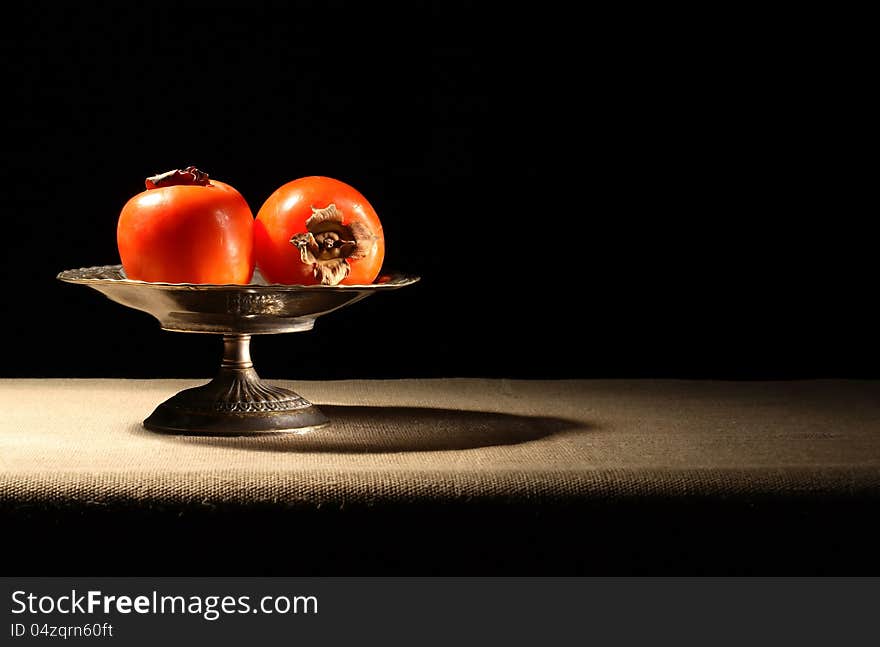 Persimmons In Bowl