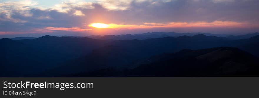 Panorama of sunset in mountains.Karpati.Ukraine.