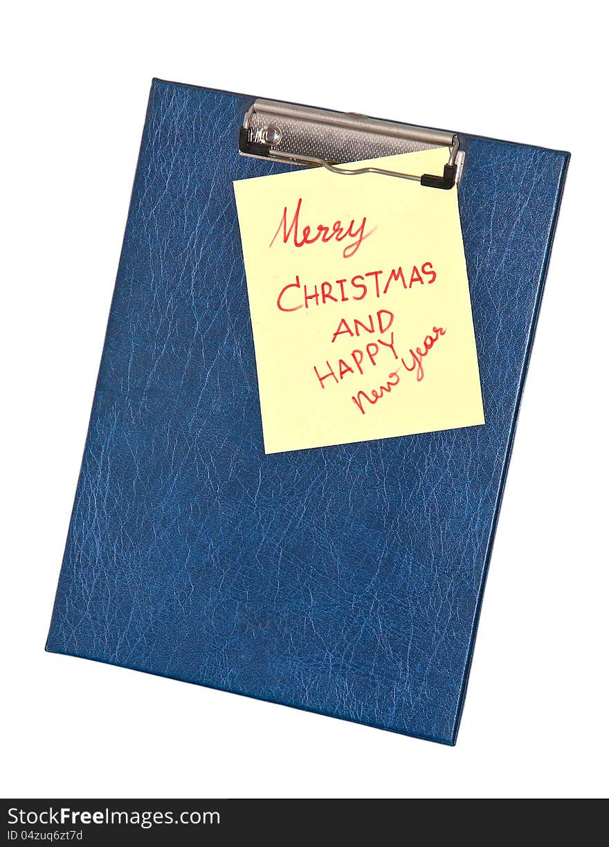 Message merry christmas in a note on the clip board. Message merry christmas in a note on the clip board.