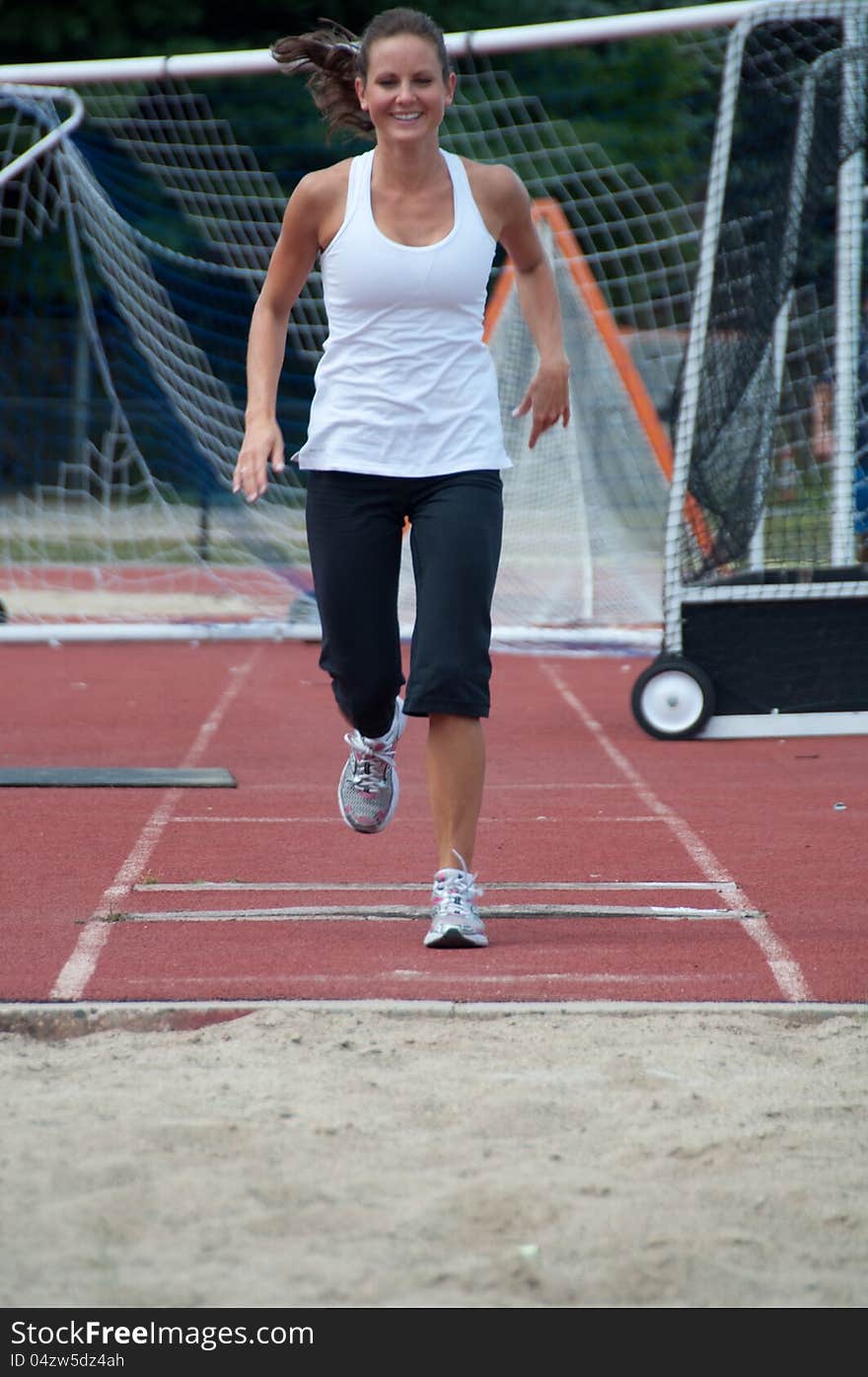 Woman Running on Field