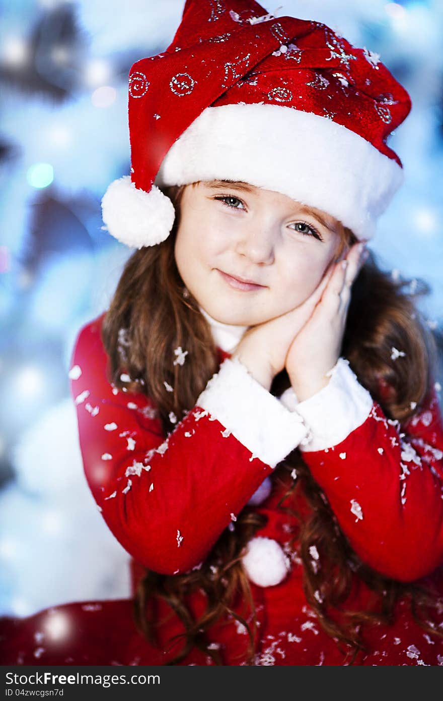 Cute girl and Christmas Tree