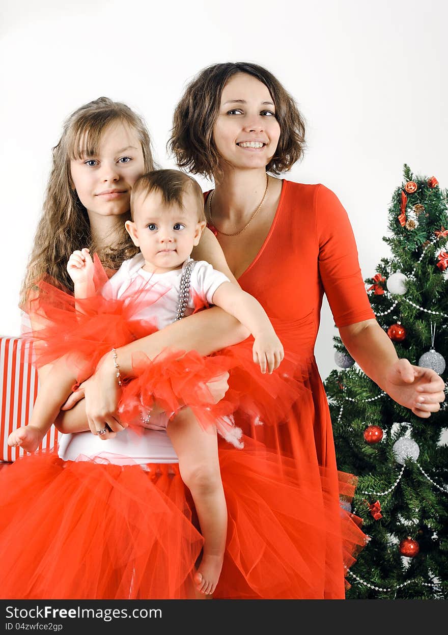 Happy and smiling Christmas family in a studio. Happy and smiling Christmas family in a studio