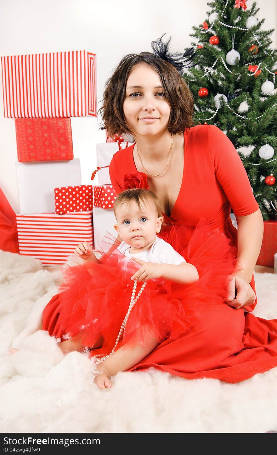 Happy Mother with her daughter in a studio. Christmas time. Happy Mother with her daughter in a studio. Christmas time