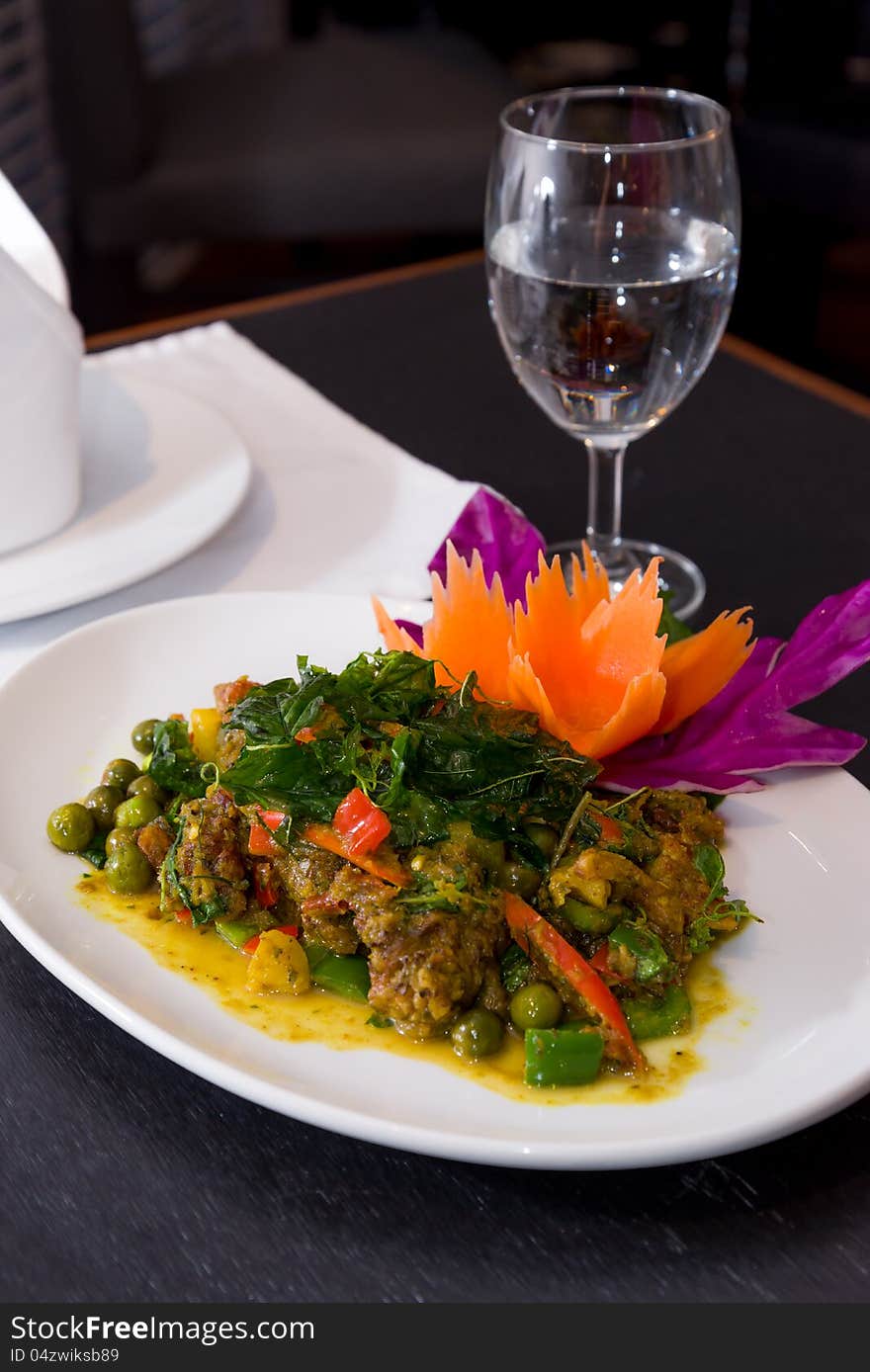 Thai green curry with shrimp set on the table