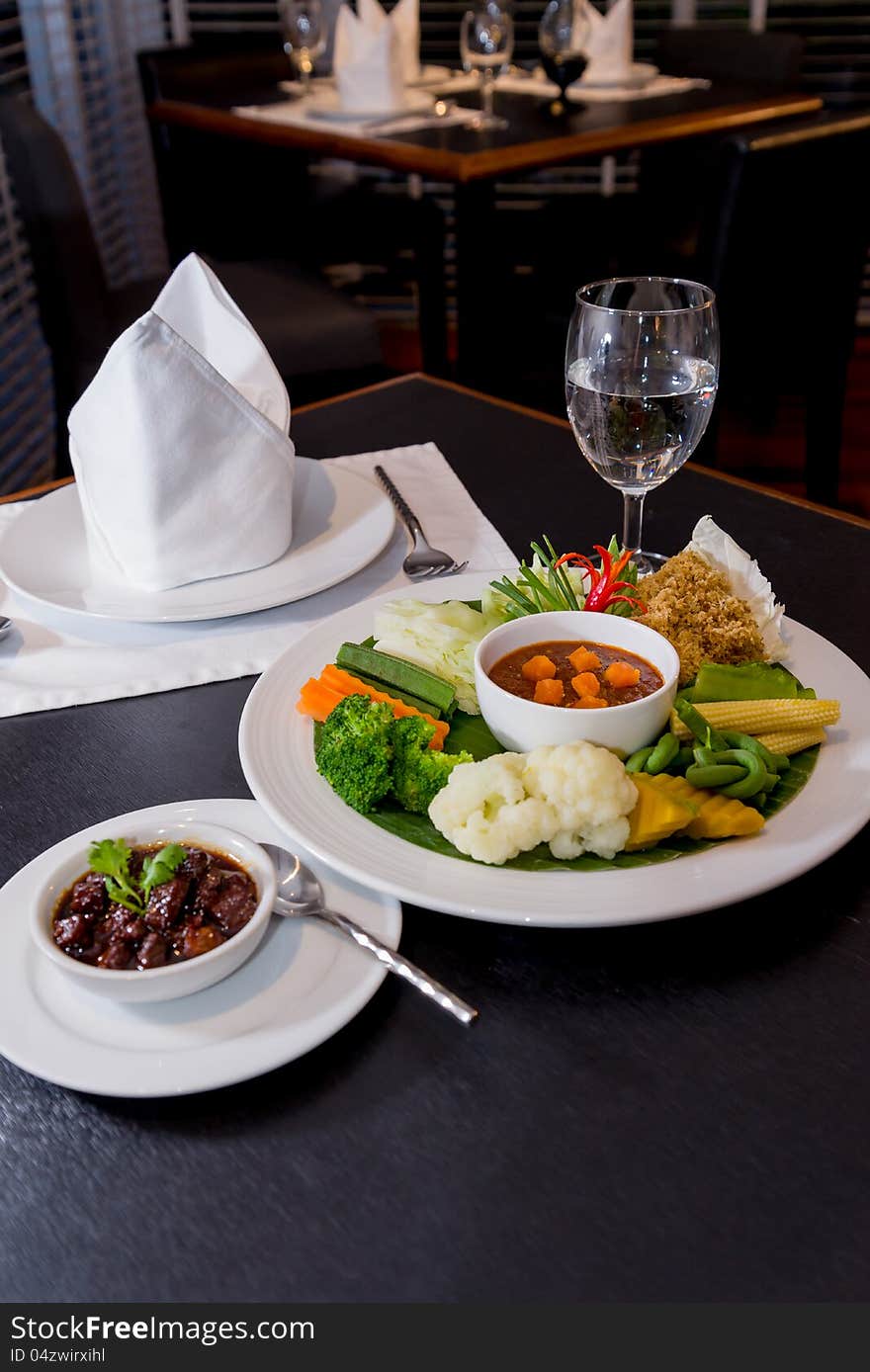 Thai food mango chilli sauce with boiled vegetable set on the table