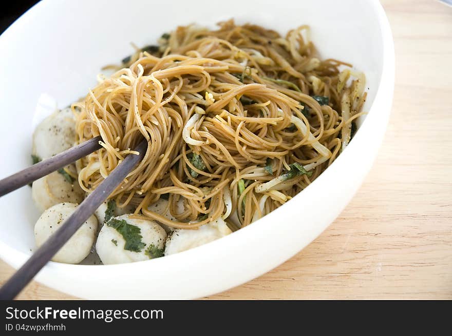 Chopsticks On Asian Noodle