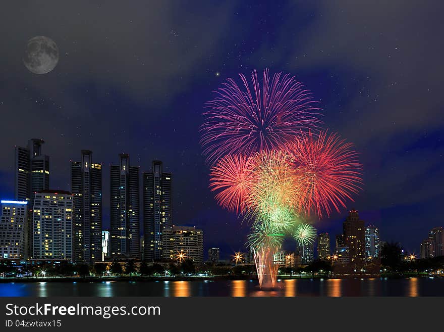 Fireworks over building cityscape